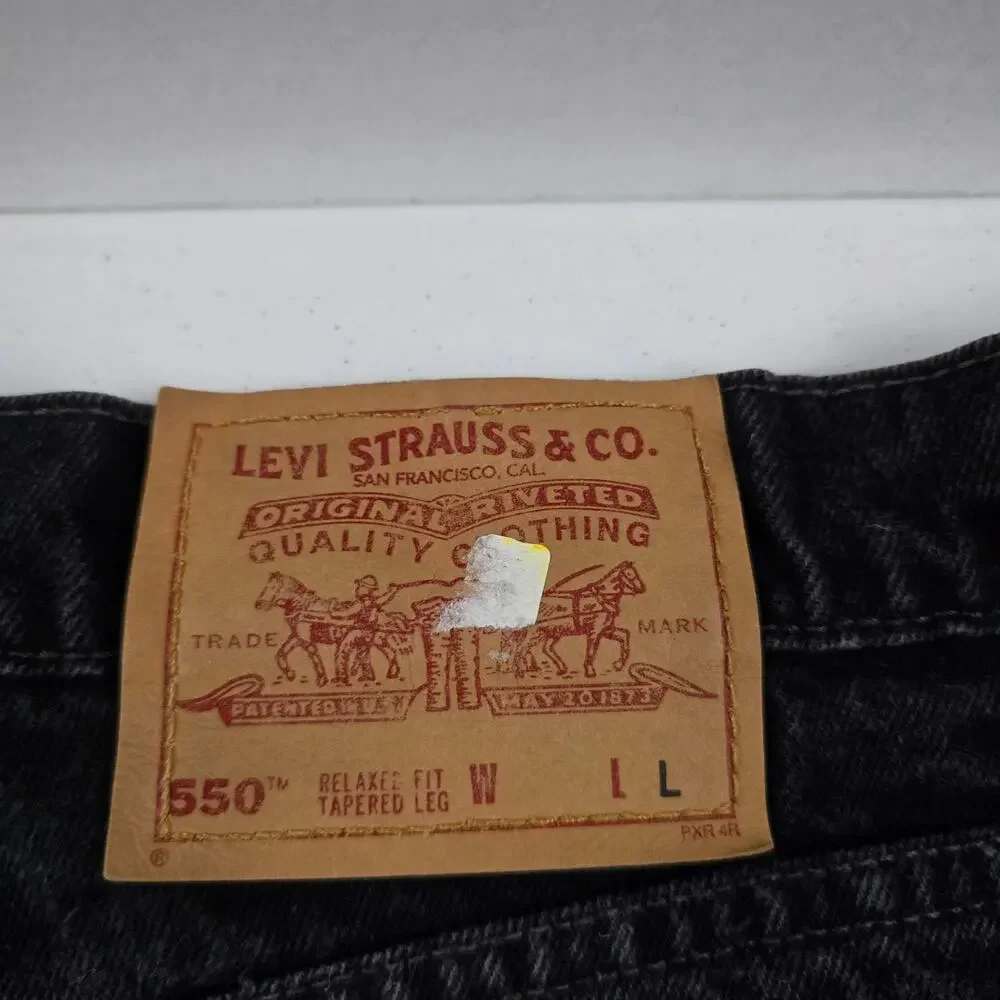 Vintage Levi's 550 relaxed‎ tapered 20 jeans USA black 90's womens 5713